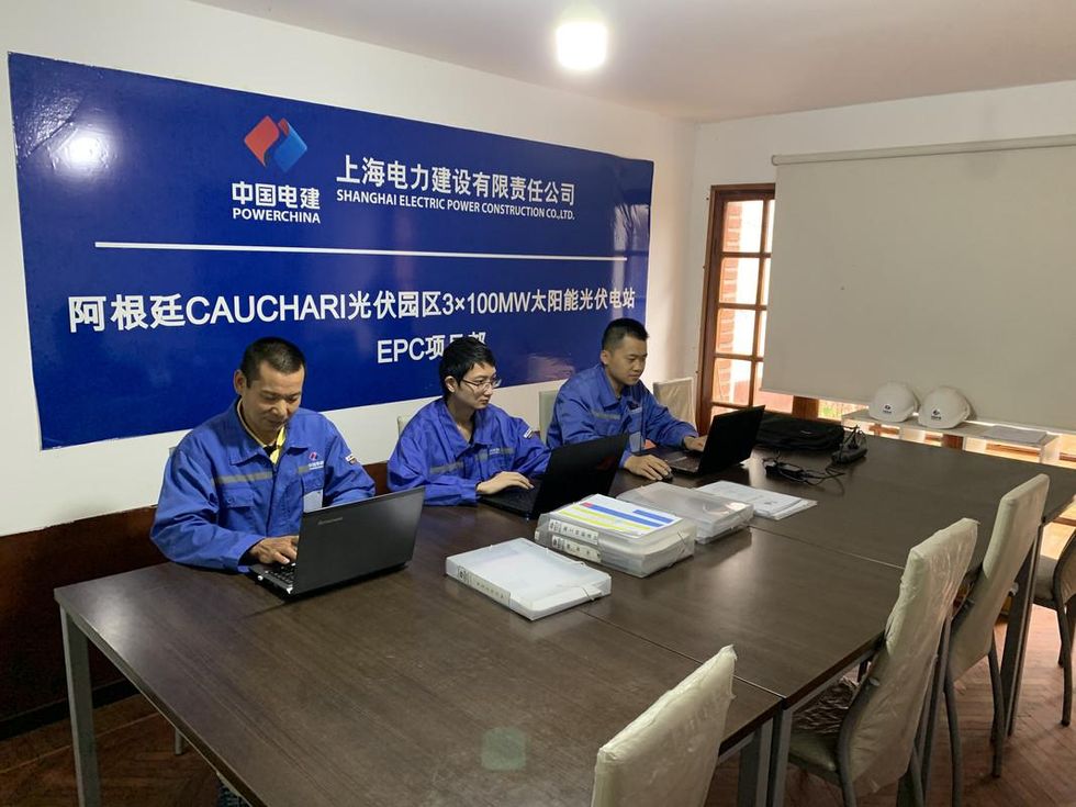 Chinese engineers working in an office at the Cauchari park