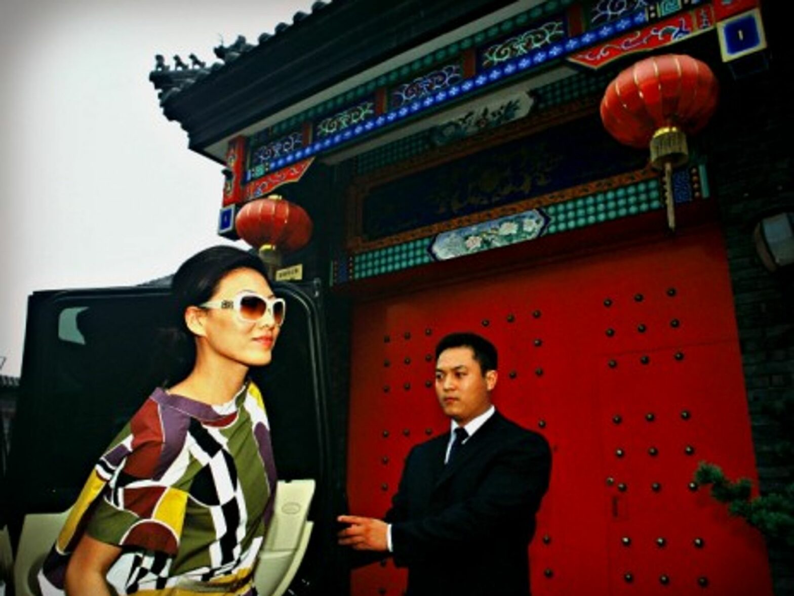 Chinese fashion shop owner Yuki Tan and her private chauffeur/bodyguard