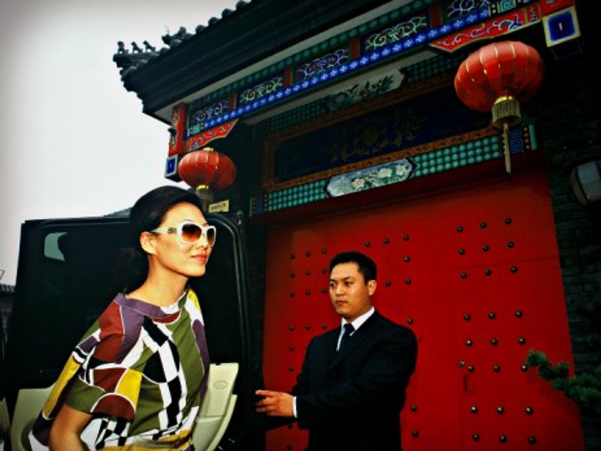 Chinese fashion shop owner Yuki Tan and her private chauffeur/bodyguard