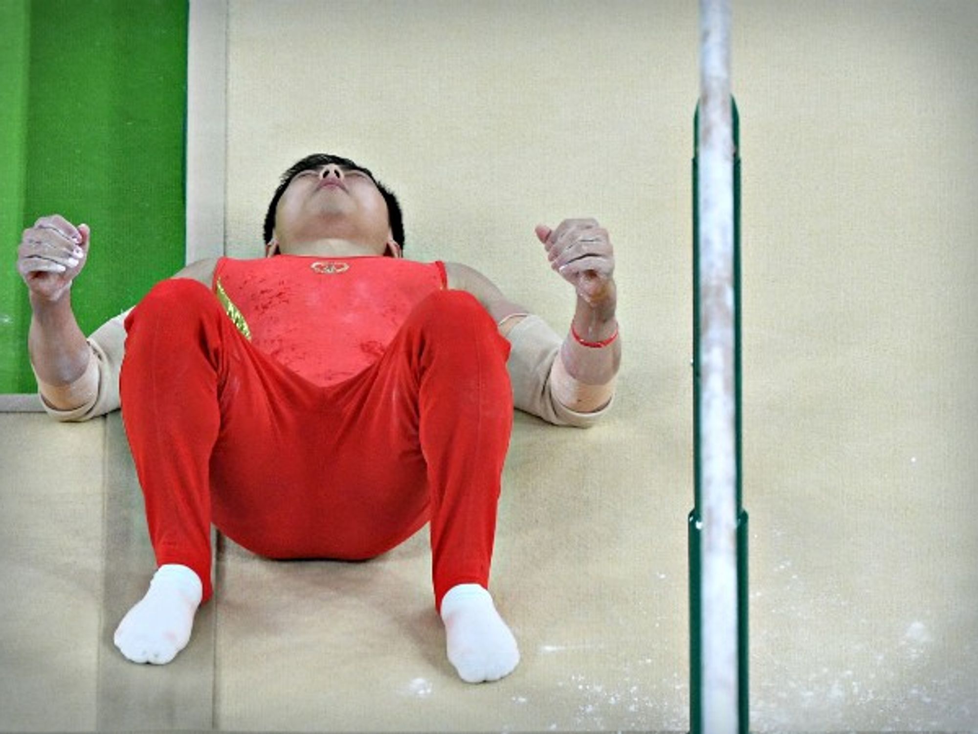 Chinese gymnast Hao You after a fall at the Rio Olympics on Aug. 16