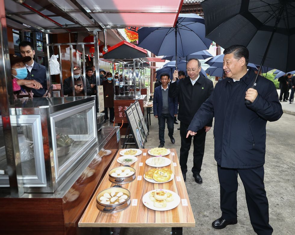 Chinese President Xi Jinping visits the Shaxian District of Sanming City.