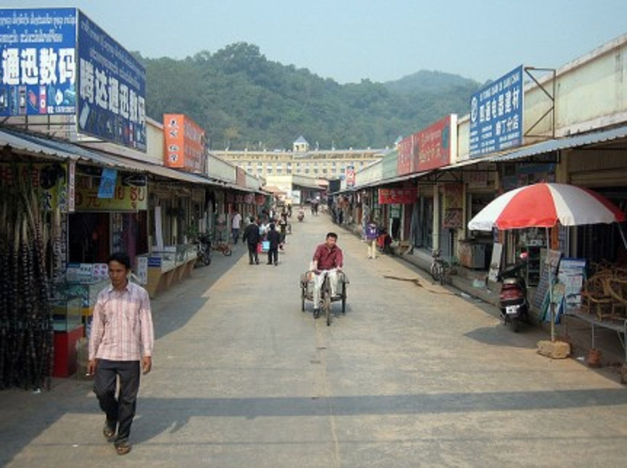 Chinese stores line a village in Luang Namtha province (Prince Roy)