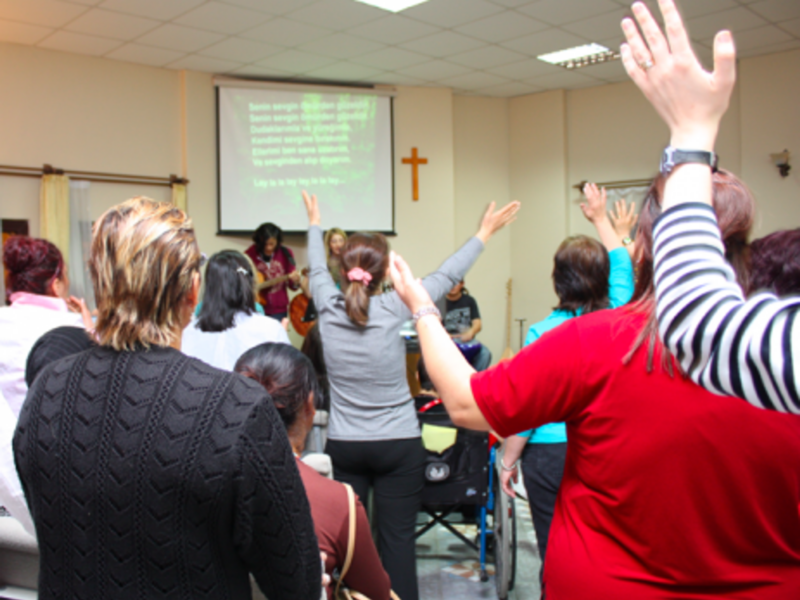 Christian praying in southeastern Turkey