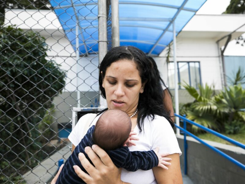 Christiane Ferreira Pinto and her son getting out of prison.