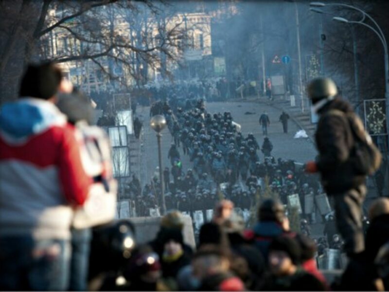 Clashes between anti-government protesters clash and riot police in Kiev on Feb. 18