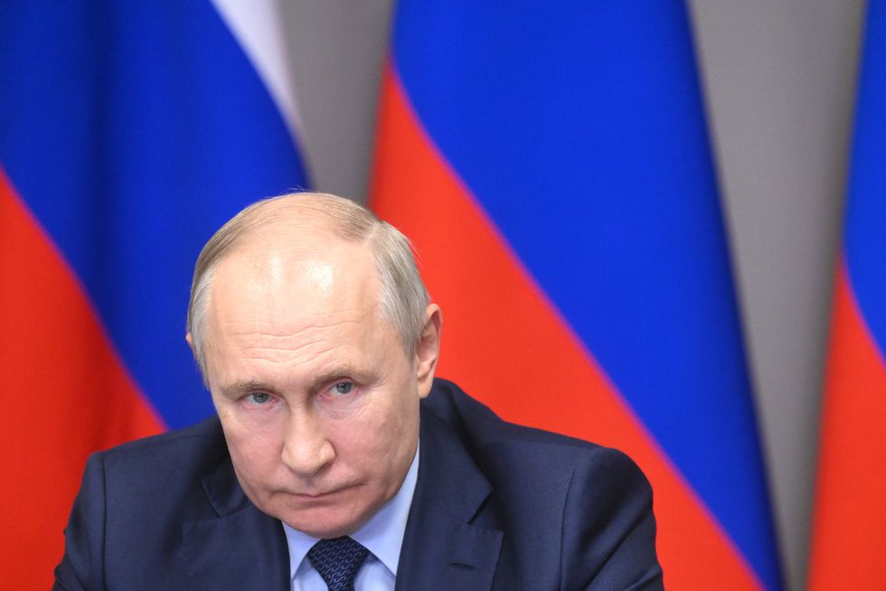 Close-up photo of Putin at a meeting with young researchers at the Russian Federal Nuclear Center - All-Russian Research Institute of Experimental Physics (VNIIEF) on Sept. 8, 2023