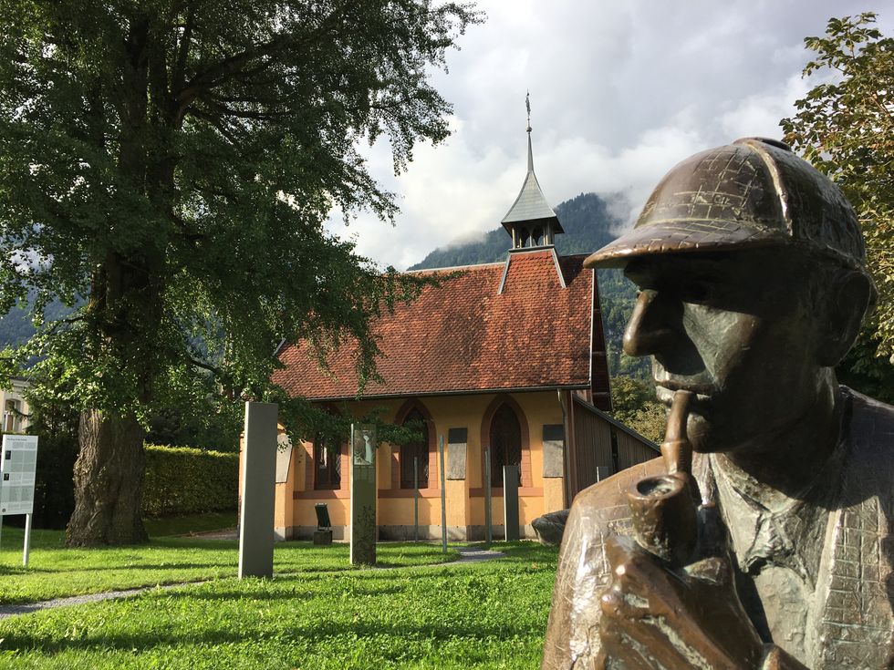 Close up shot of the Sherlock Holmes Monument in Meiringen, Switzerland