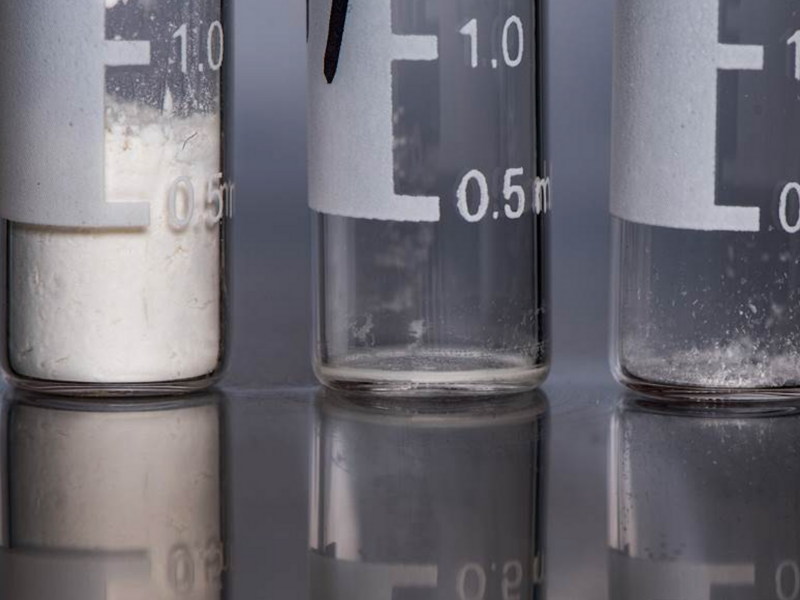 Closeup photo of three test tubes containing heroin, carfentail and fentanyl