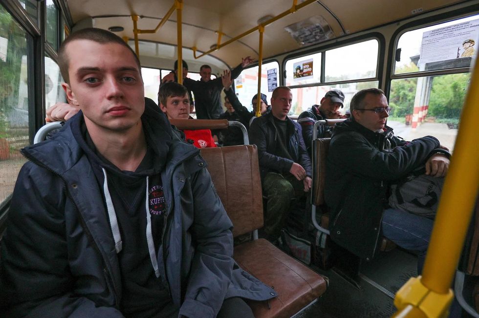 Conscripts in a bus at a recruitment center leaving the city of Kineshma for war