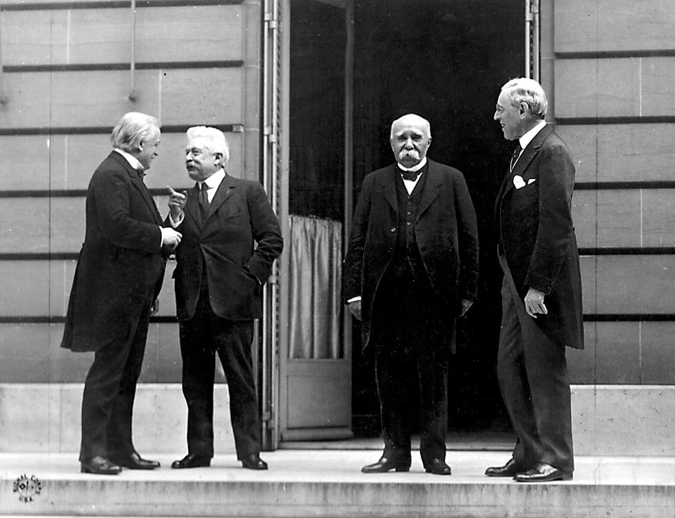Council of Four at the WWI Paris peace conference, May 27, 1919 (candid photo) (L - R) Prime Minister David Lloyd George (Great Britain), Prime Minister Vittorio Emanuele Orlando (Italy), Premier Georges Clemenceau (France), President Woodrow Wilson (USA)