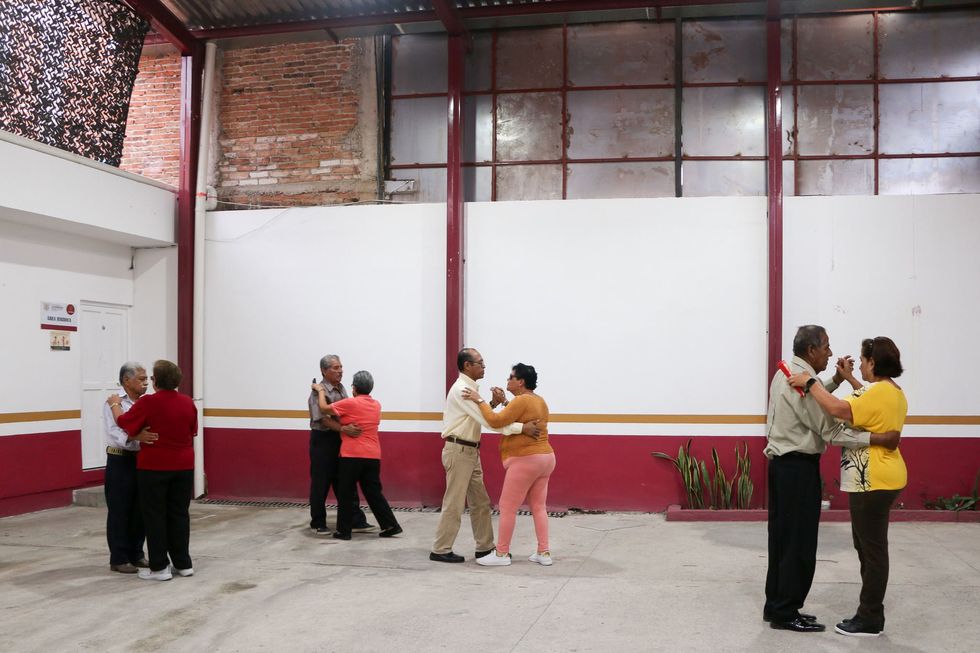 Couples practice danzón, a Cuban dance, at the Guerrero Institute for the Comprehensive Care of Older Adults.