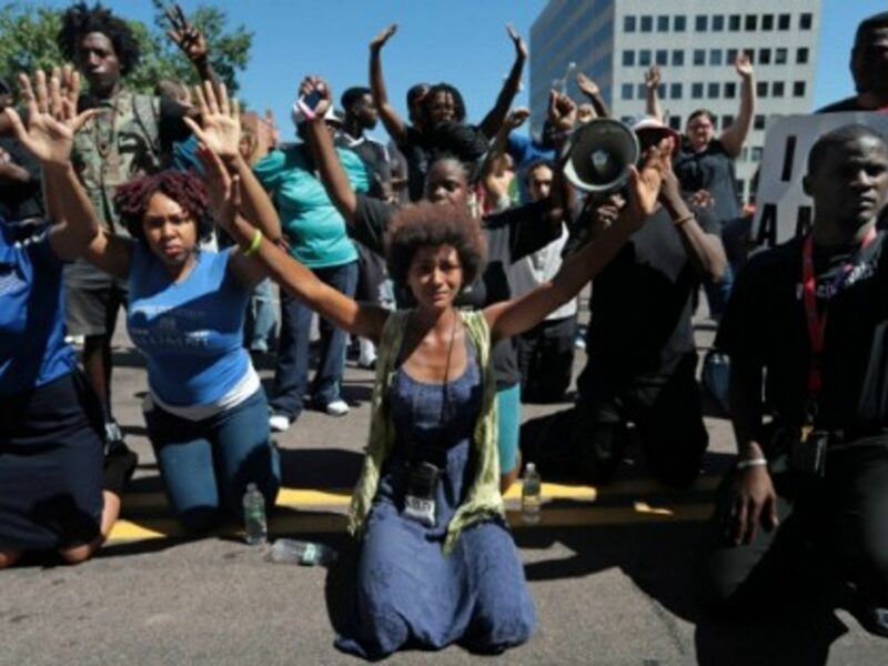 Crowds gathered Tuesday in Clayton, Missouri, to protest the fatal shooting of Michael Brown by a police officer in Ferguson Saturday.