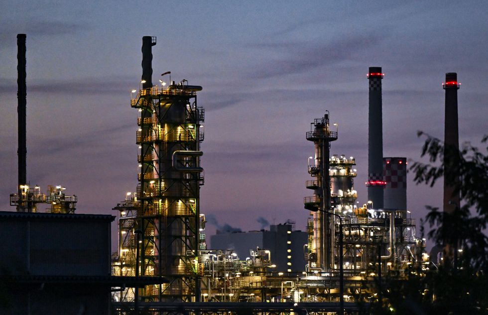 Crude oil processing facilities on the site of PCK-Raffinerie GmbH in the evening. The refinery in the Uckermark region of northeastern Brandenburg supplies fuel to large parts of northeastern Germany