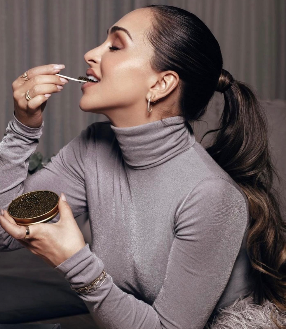 Danielle Lavsky eating caviar.
