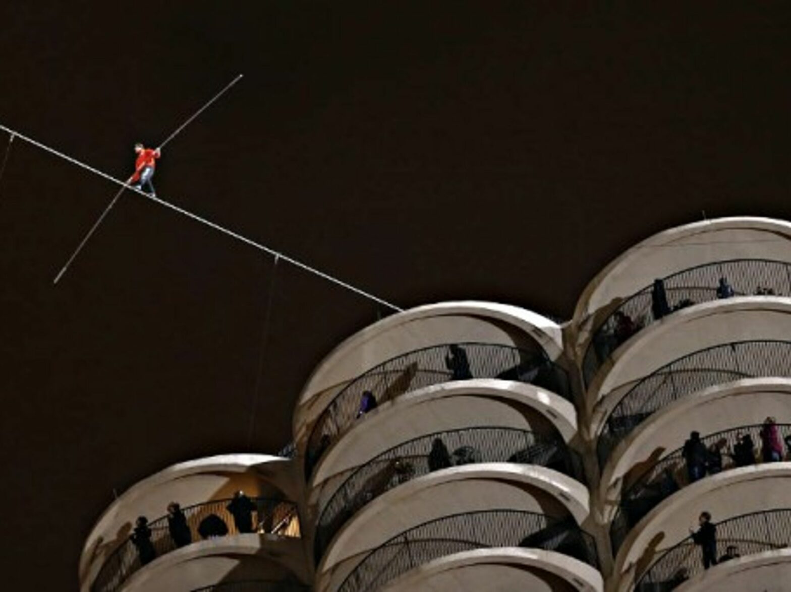 Daredevil Nik Wallenda walking a tightrope Sunday in Chicago