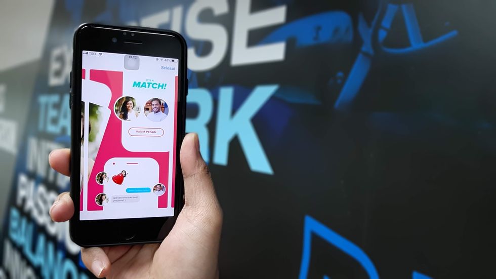 Dating app Tinder on the display of an iPhone.
