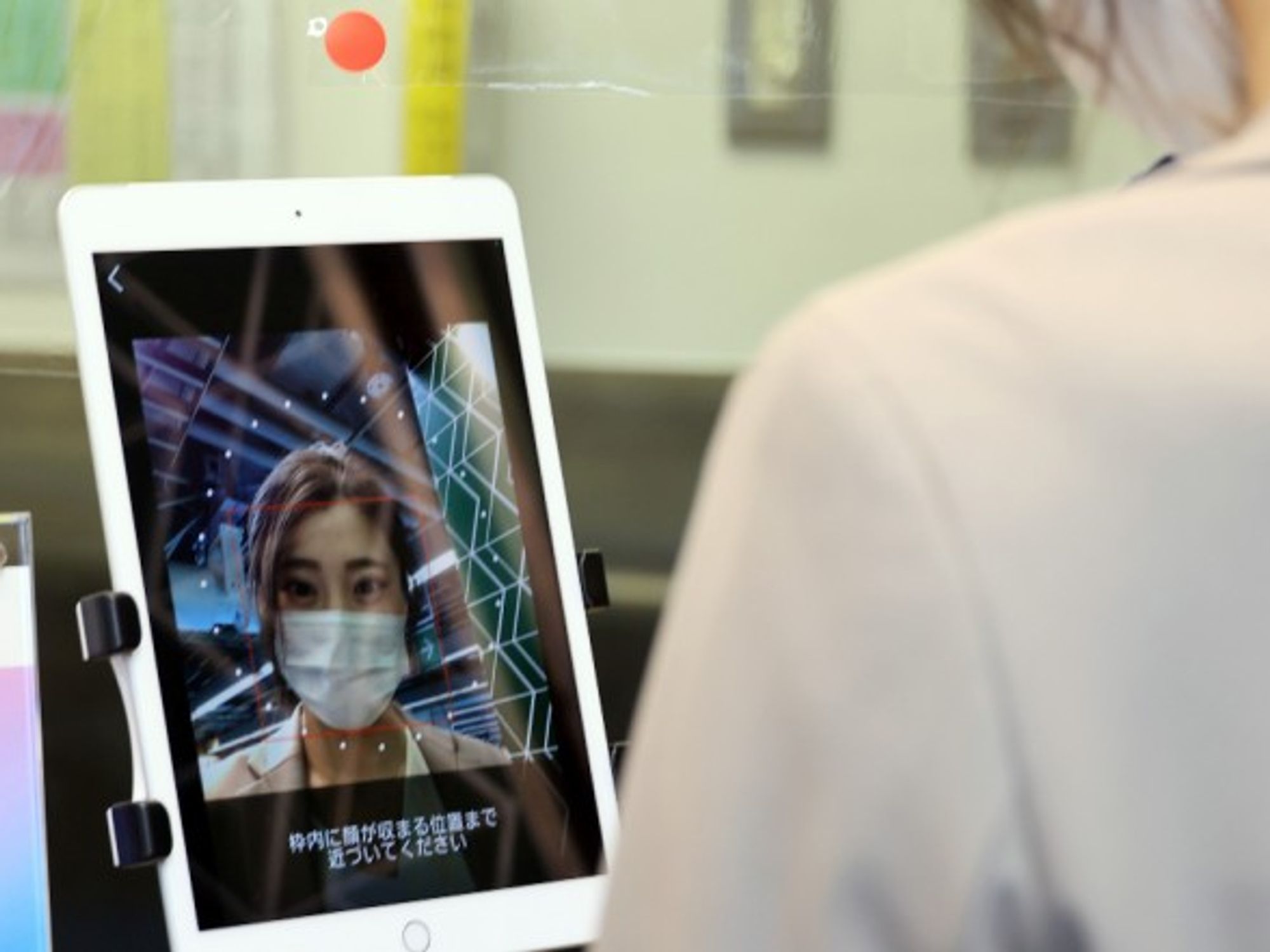 Demonstrating face recognition payment service in Japan