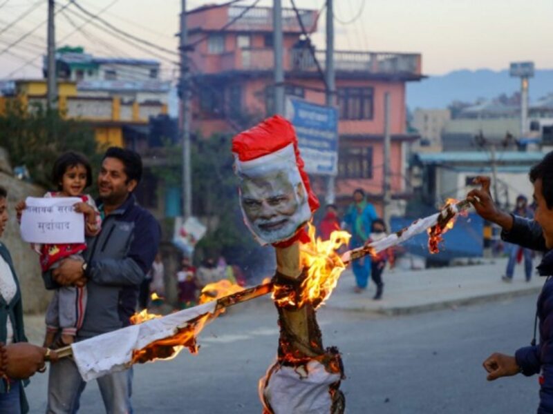 Demonstrators burns an effigy of Indian Prime Minister Narendra Modi during a protest against the encroachment of Nepal border by India.