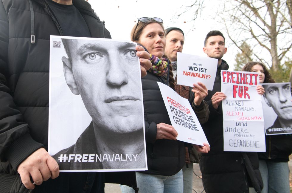 Demonstrators demand freedom for all political prisoners in Russia, including Kremlin critic Alexei Navalny.