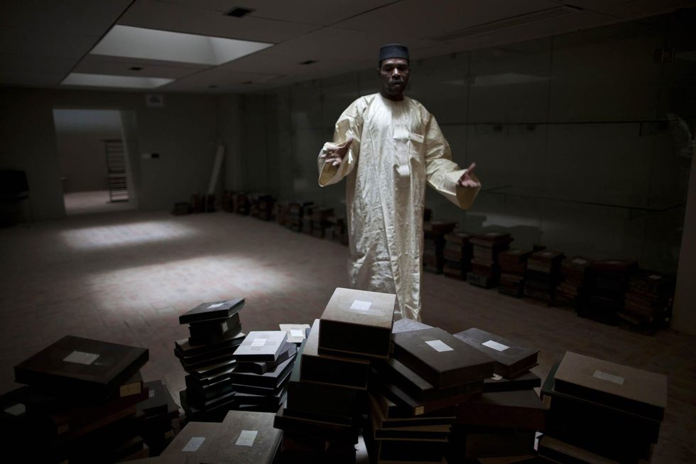 Deputy Director Abdoulaye Cisse explains how over 10000 manuscripts were hidden and saved at the Institut des Hautes Etudes et de Recherche Islamiques Ahmed Baba in Timbuktu, North of Mali.