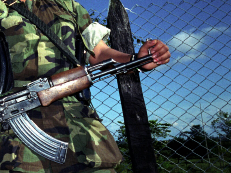 Detail of an archive photo (2005) showing a young FARC fighter in Colombia in 2005