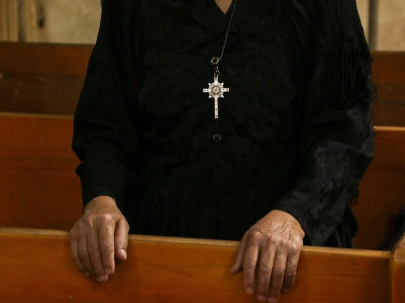 Detail shot of a Coptic priest attending Mass in Cairo