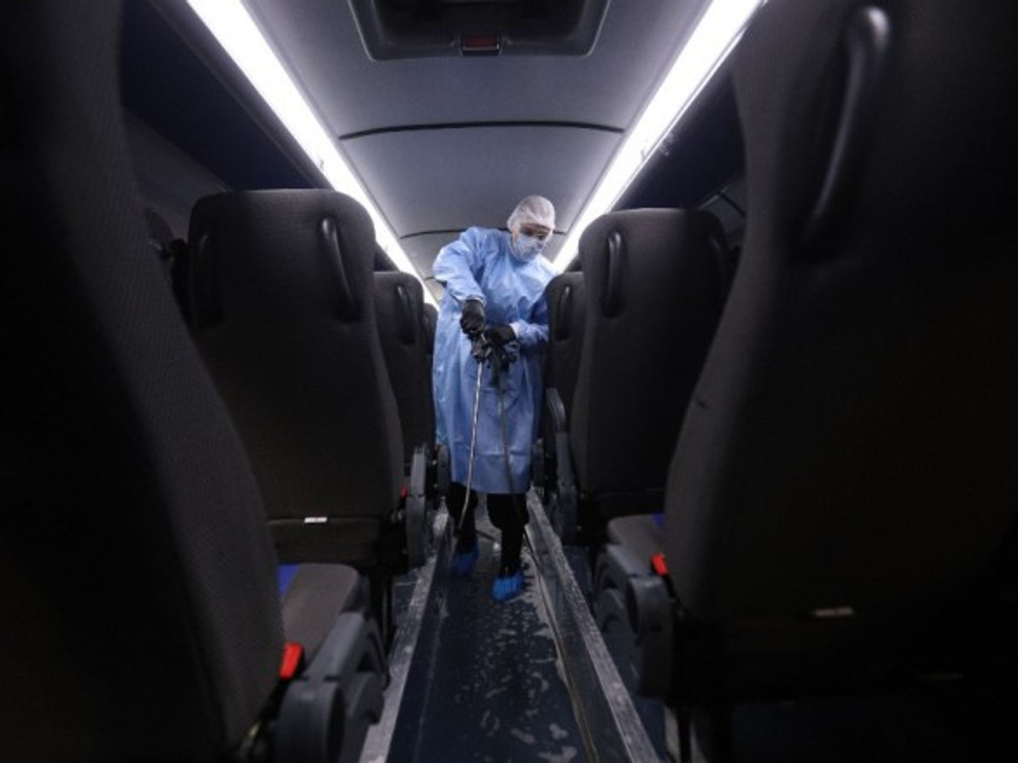Disinfecting a bus in St. Petersburg, Russia