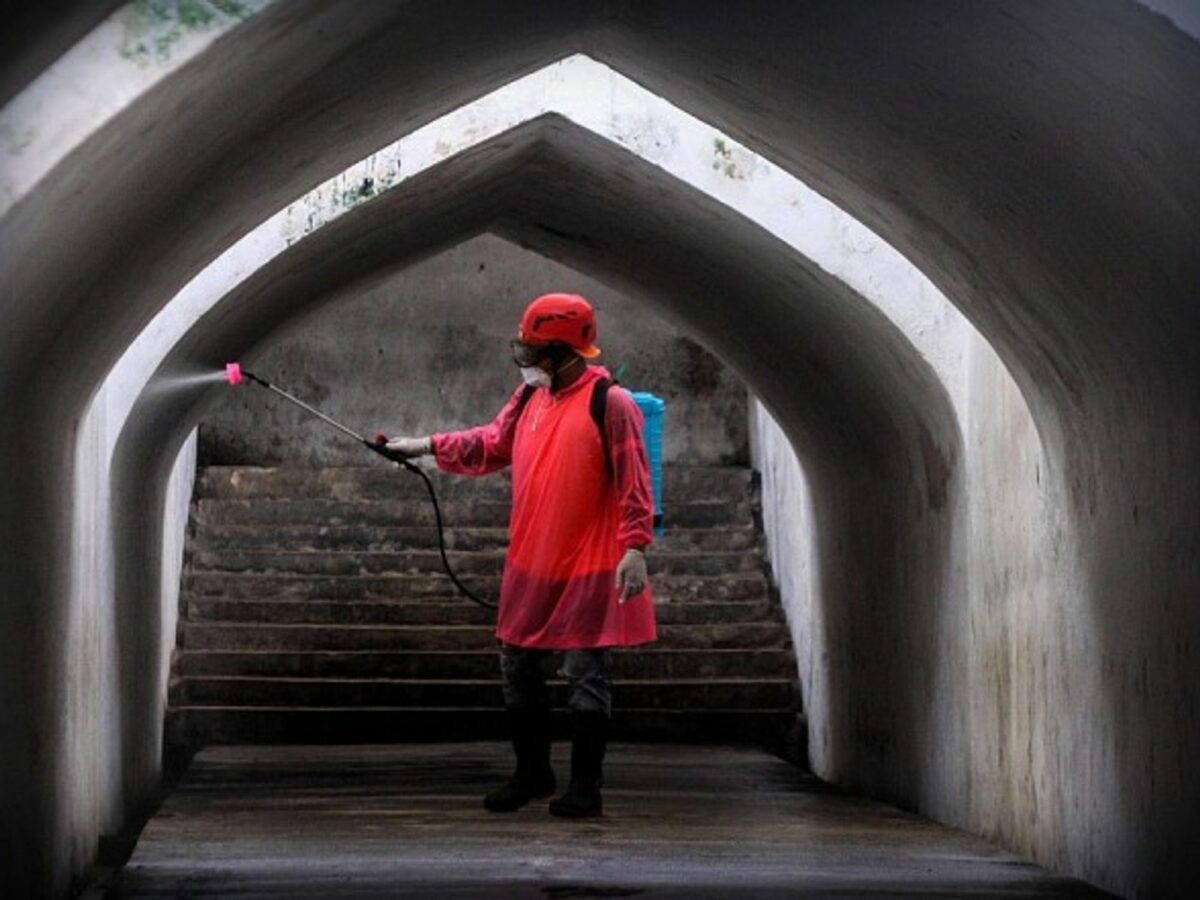 Disinfecting an Indonesian underpass last March