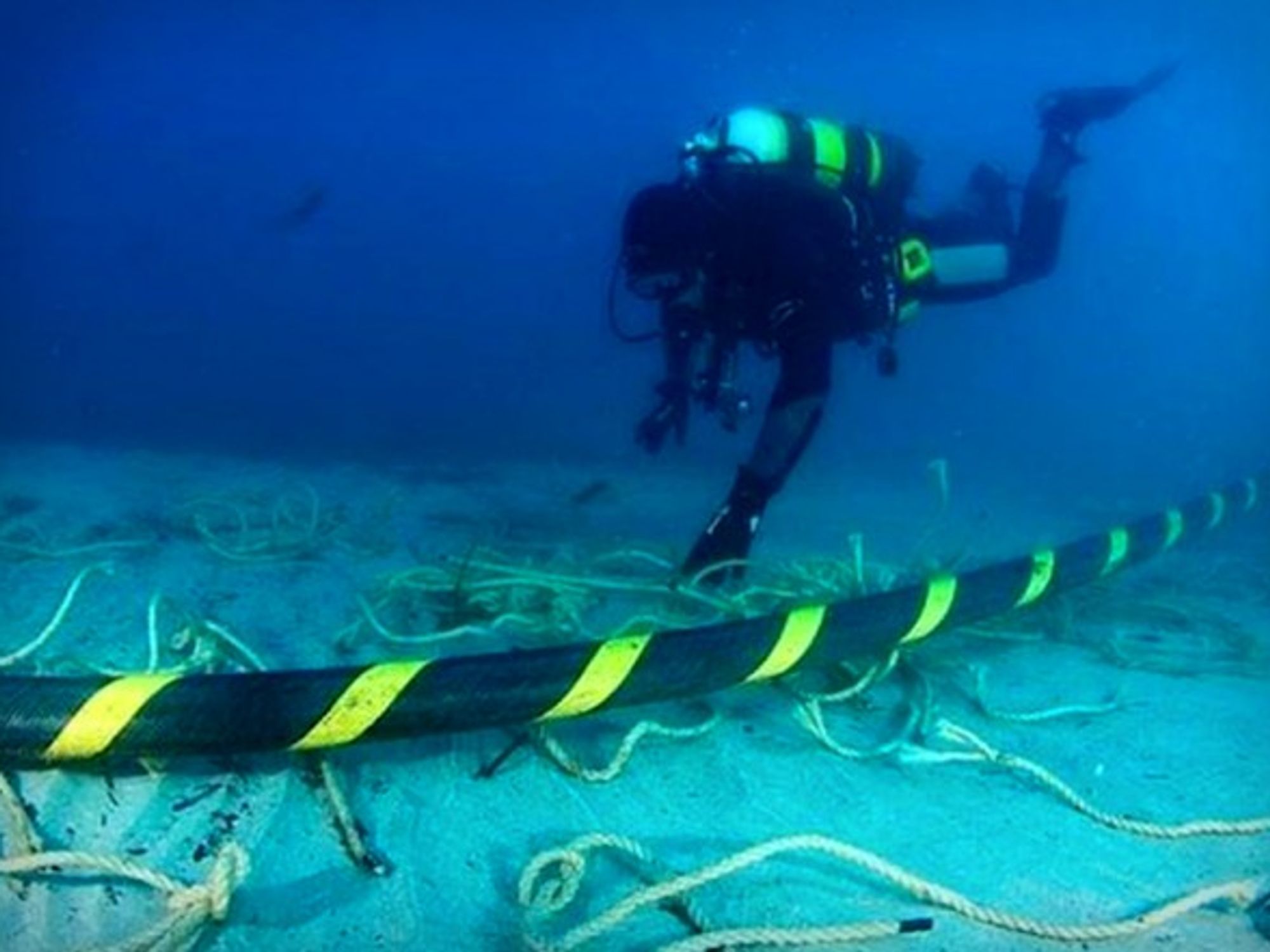 Diver checking a submarine cable
