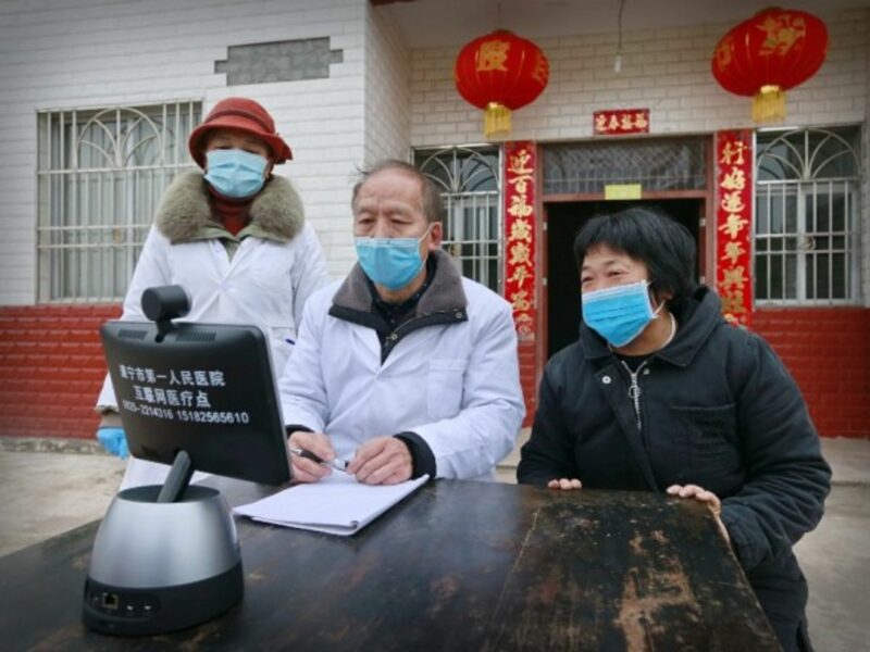 Doctors holding consultations remotely with patients in Suining, China