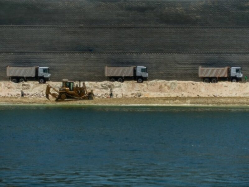 Dredging the extension of the Suez Canal.