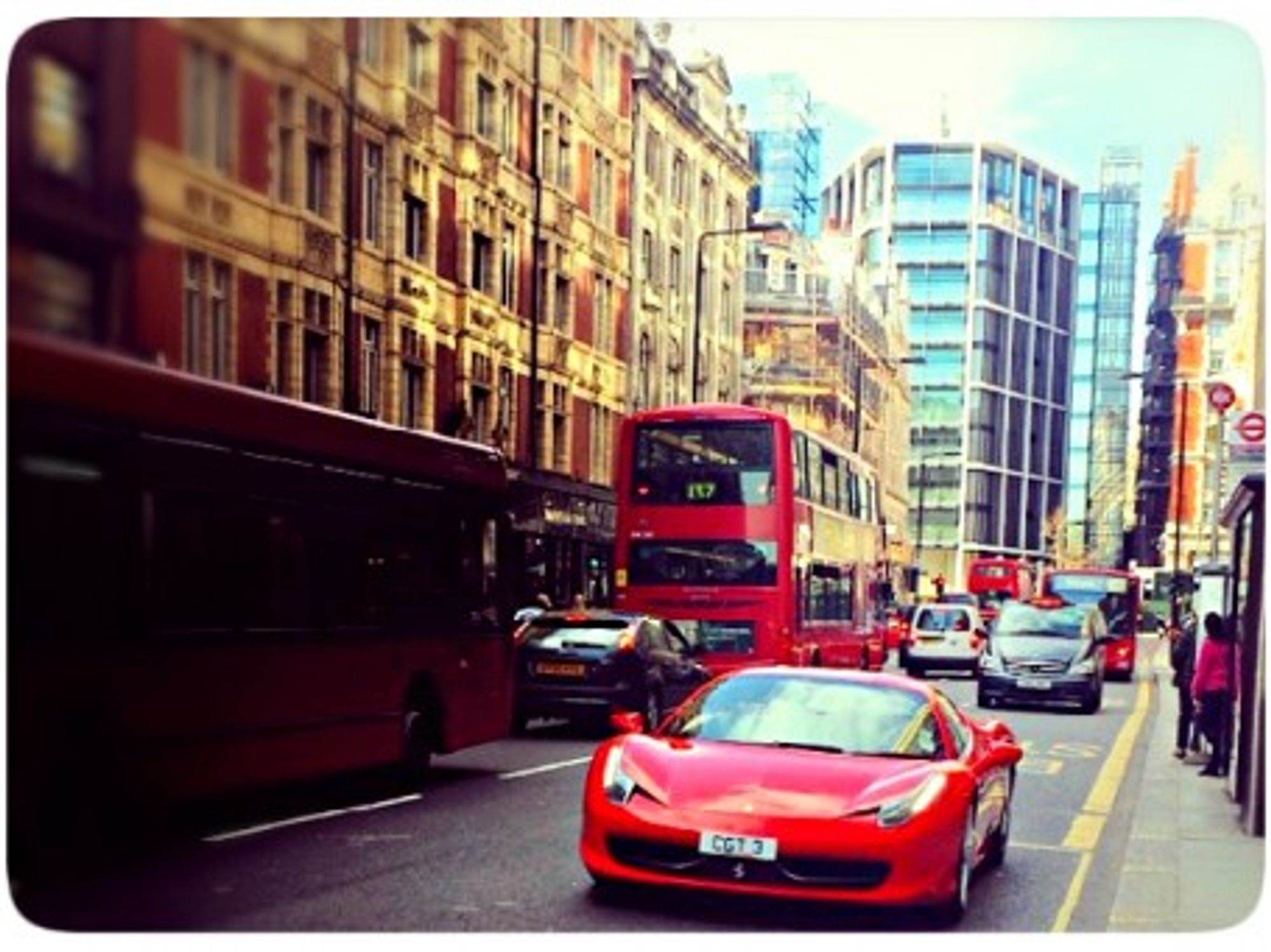Driving past London's One Hyde Park in a Ferrari