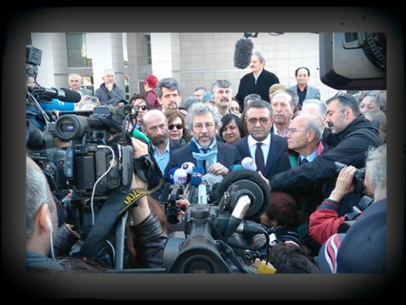 Dundar, center, after his release from jail.