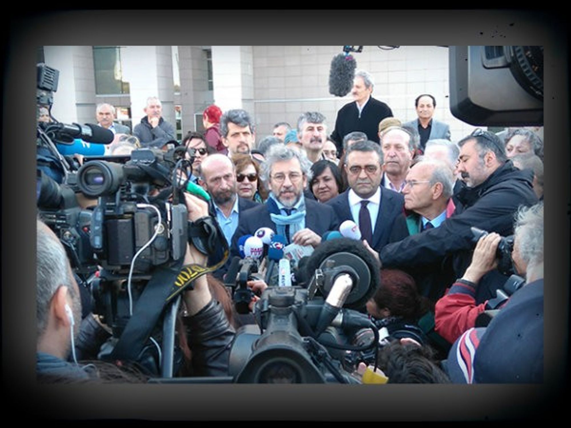 Dundar, center, after his release from jail.