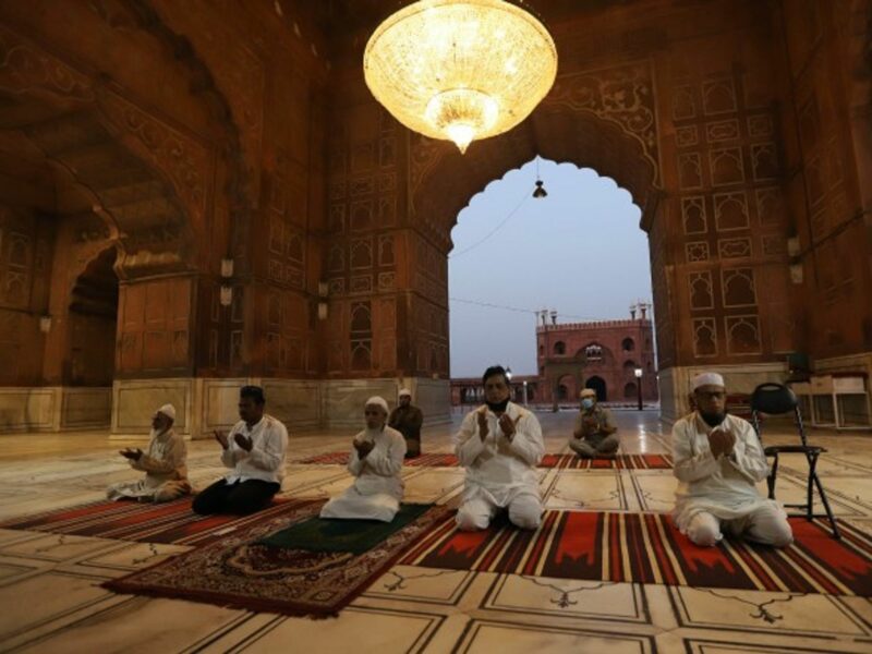 During Ramadan, Muslim men in New Delhi pray at a social distance from each other.