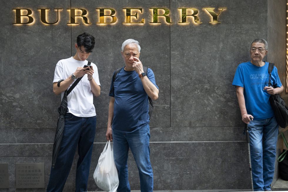 ​2024, Hong Kong: people are stand outside the British luxury fashion brand Burberry store.