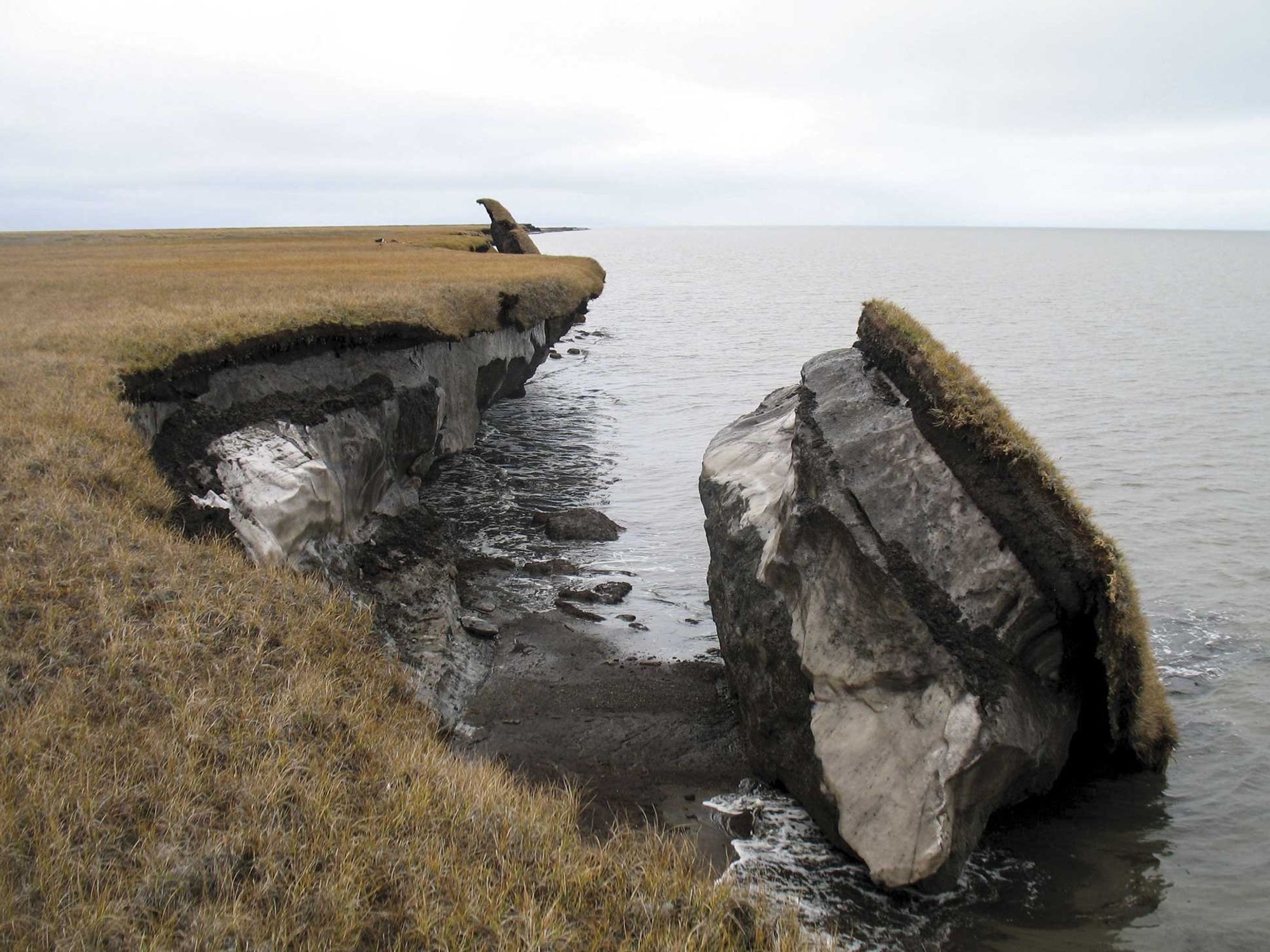 ​A collapsed block of ice-rich permafrost along Drew Point, Alaska.