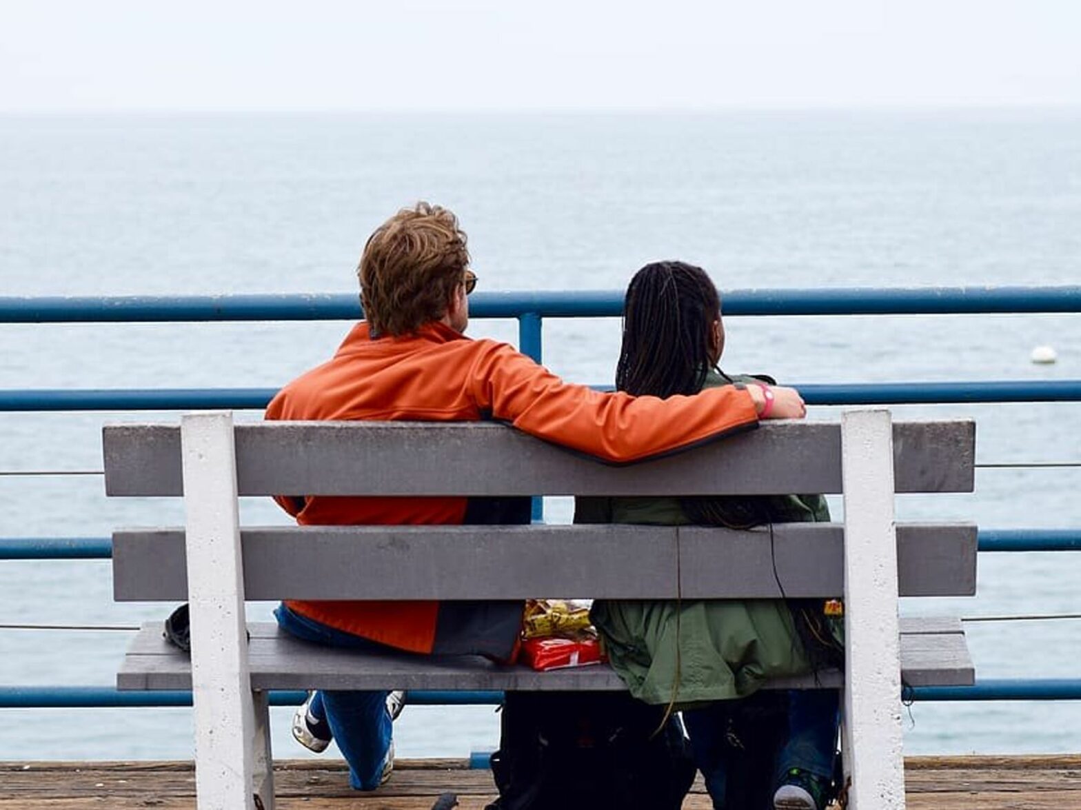 ​A couple looking at the beach.
