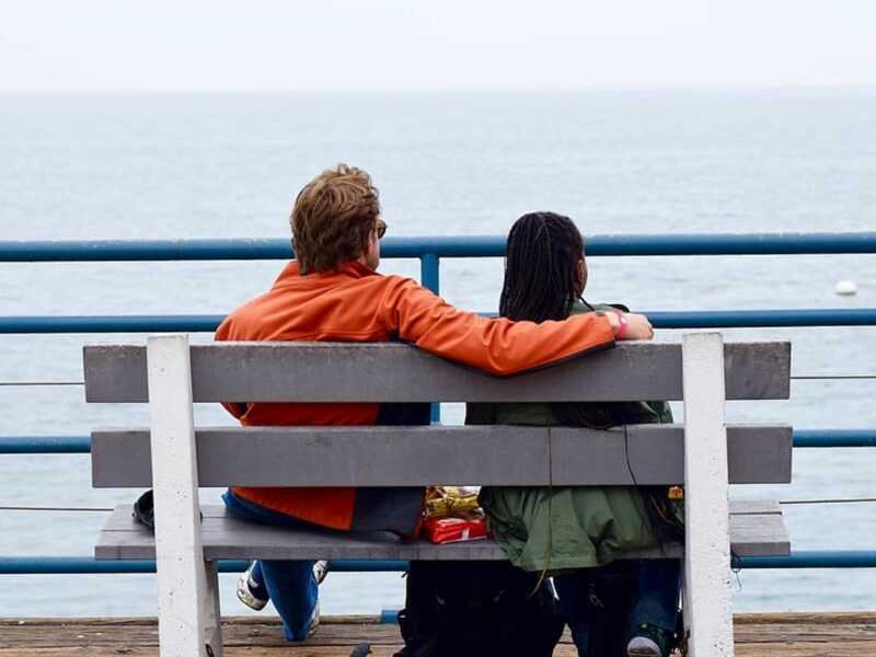 ​A couple looking at the beach.