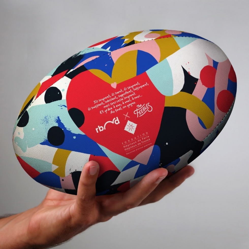 ​A multi coloured recycled rugby ball.