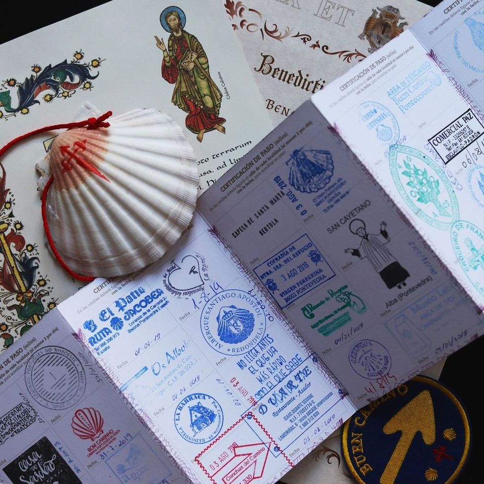 ​A Pilgrim Passport (or credencial), a document to be stamped along the Camino de Santiago.