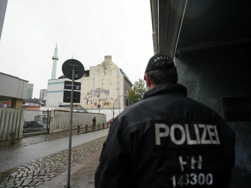 ​A policeman stands in front of the Centrum Mosque of the Islamic Community in Hamburg, Germany.