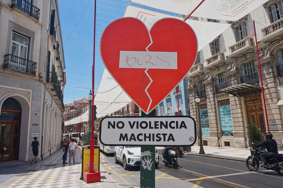​A street sign in Granada, Spain that says "No male violence," Oct. 24, 2024.