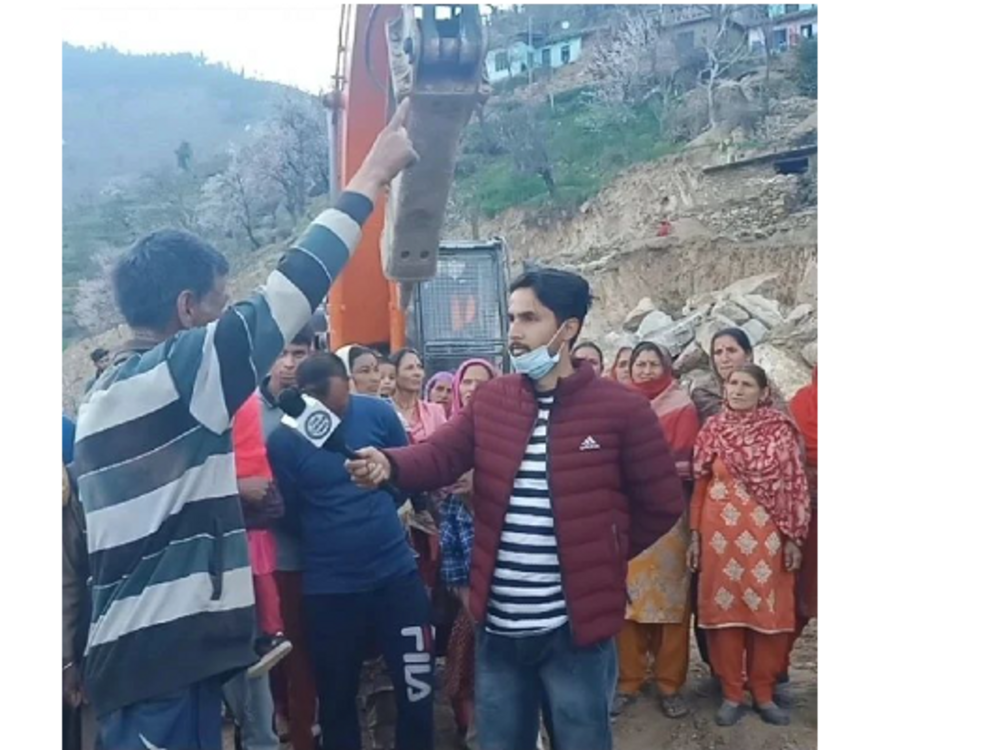 ​A team member of 'The Chenab Times' reporting in India