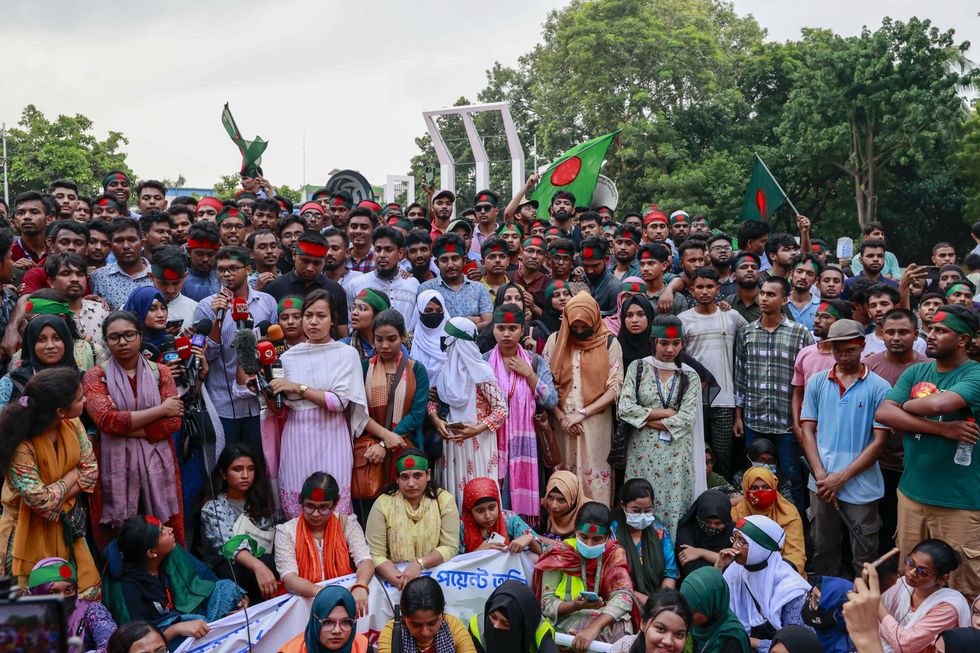 ​Activists of Students against Discrimination movement protest as part of the so-called 'Resistance Week' road march at the Dhaka University campus to press home their four-point demand that includes the trial of ousted prime minister Sheikh Hasina, Dhaka, Bangladesh, Aug. 13 2024.
