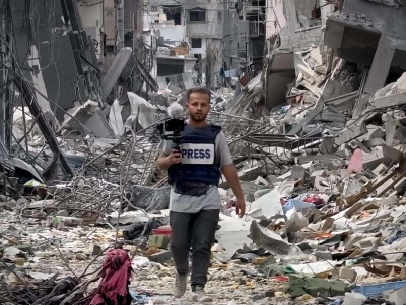 ​Ahmed al Danaf walking through the destroyed city.