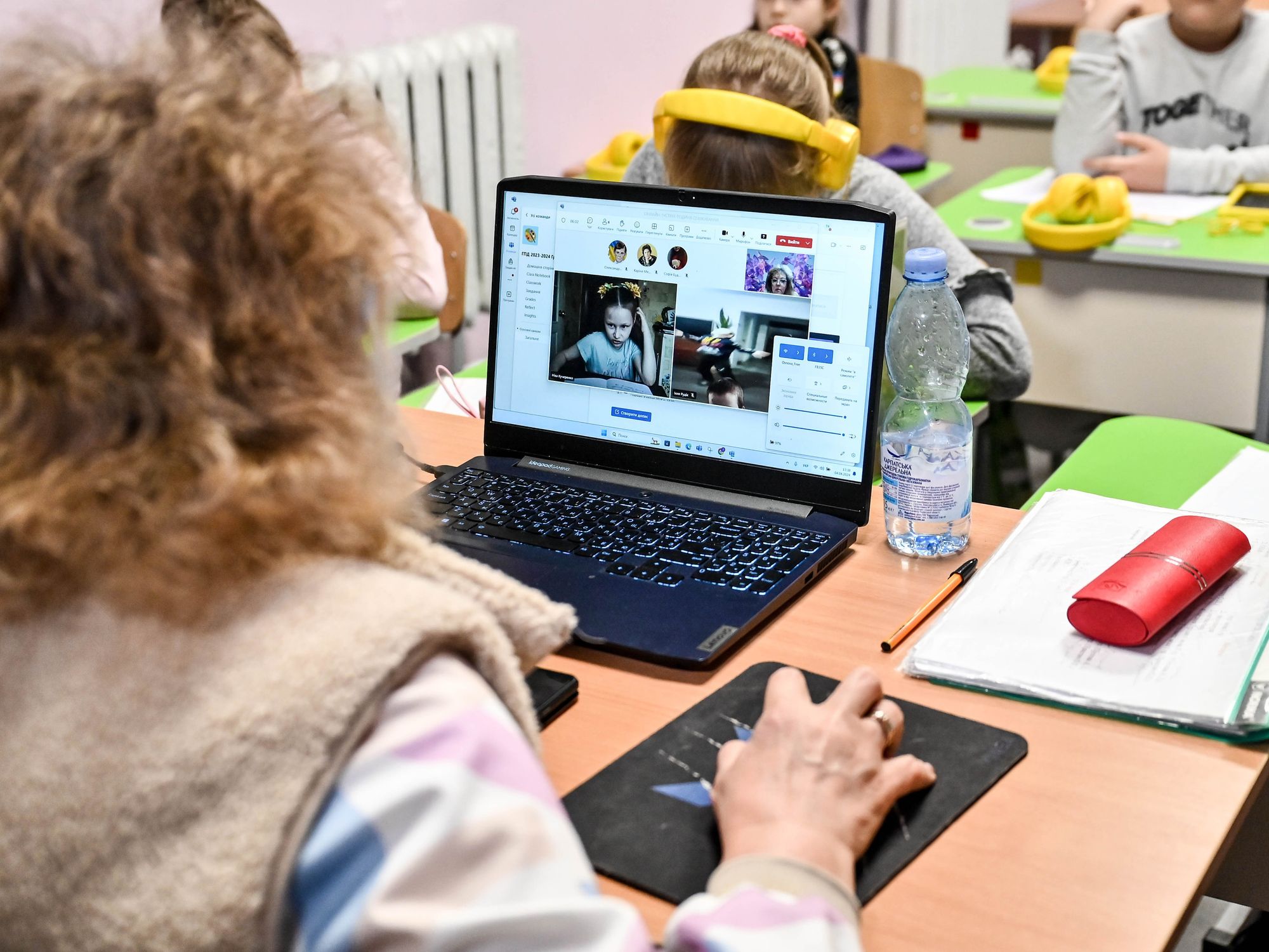 ​APRIL 04, 2024 - Children on the laptop screen during a mixed online-offline lesson at a local school, Zaporizhzhia, southeastern Ukraine.