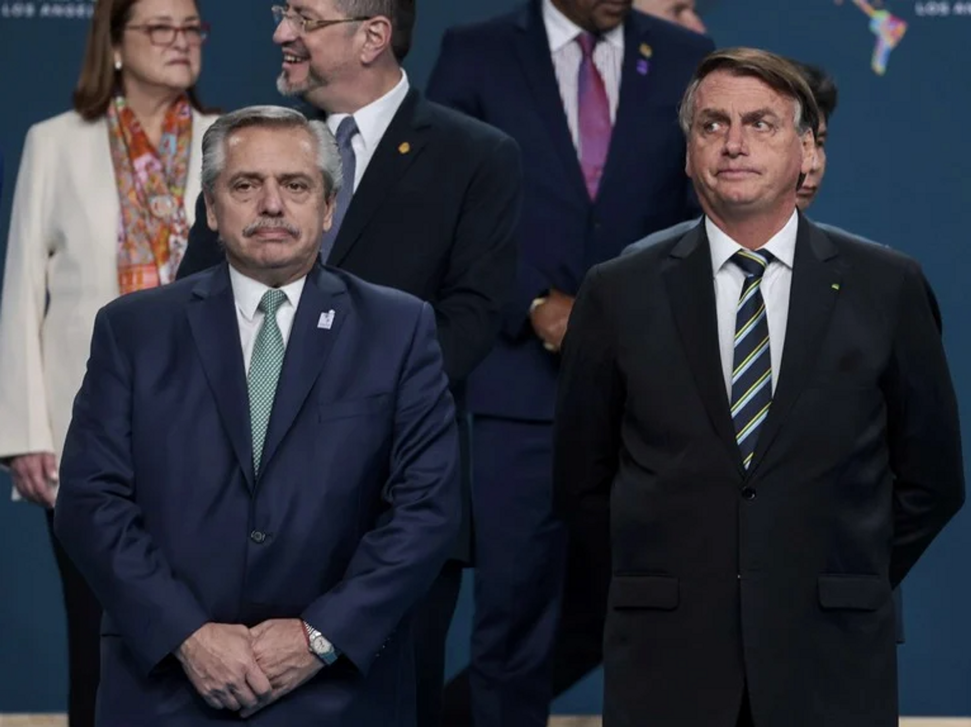 ​Argentine President Fernandez and Brazilian President Bolsonaro standing side by side at the 2022 Summit of the Americas