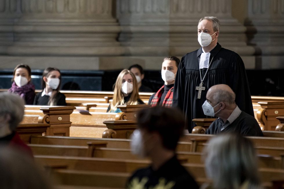 ​Bishop of the Evangelical Church Berlin-Brandenburg-Silesian Upper Lusatia attending an Easter Sunday service.