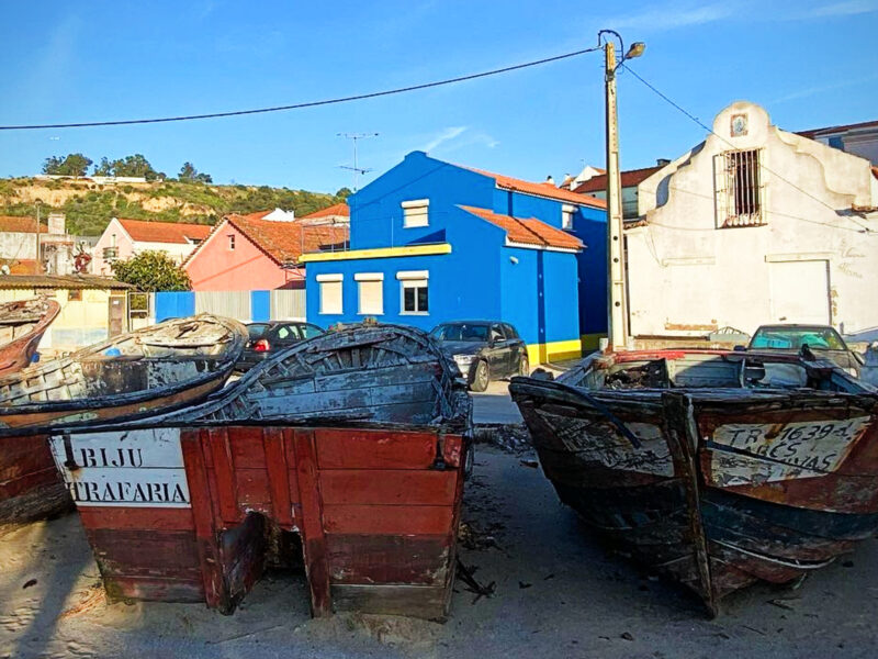 ​Boats sitting on the beach near Lisbon.